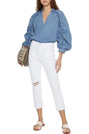 FRAME Le Beau cropped distressed high-rise slim-leg jeans