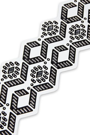 ALAÏA Studded two-tone laser-cut leather belt