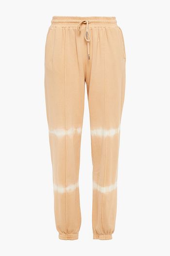 NINETY PERCENT Tie-dyed French cotton-terry track pants