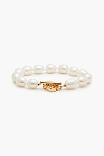 KATE SPADE NEW YORK Goldfarbenes Armband mit Kristallen und Perlen
