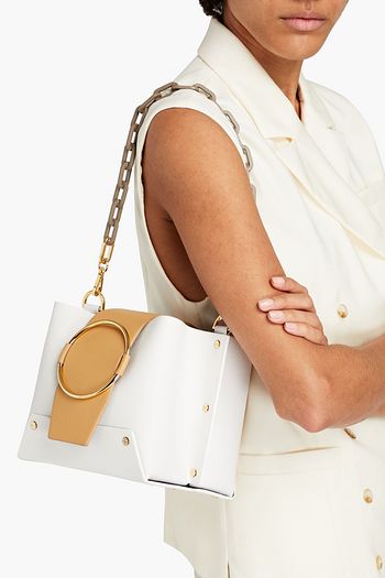 YUZEFI Delila studded pebbled-leather shoulder bag