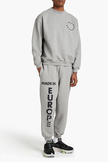 VETEMENTS Tapered printed French cotton-blend terry sweatpants
