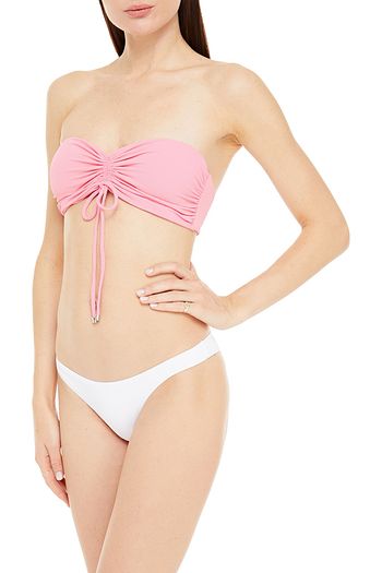 NICHOLAS Ruched stretch-piqué bandeau bikini top
