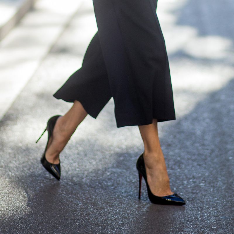 Red heels with embellished toes by Christian Louboutin