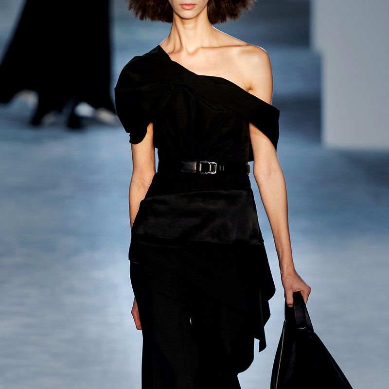 Model wearing white dress with floral details by 3.1 Phillip Lim