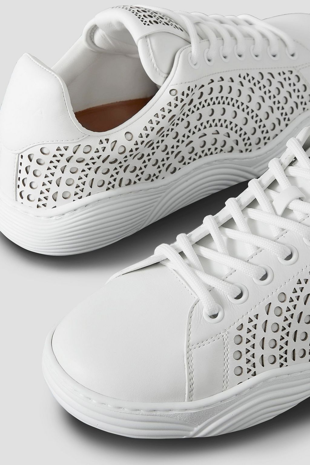 ALAÏA Lasercut leather sneakers THE