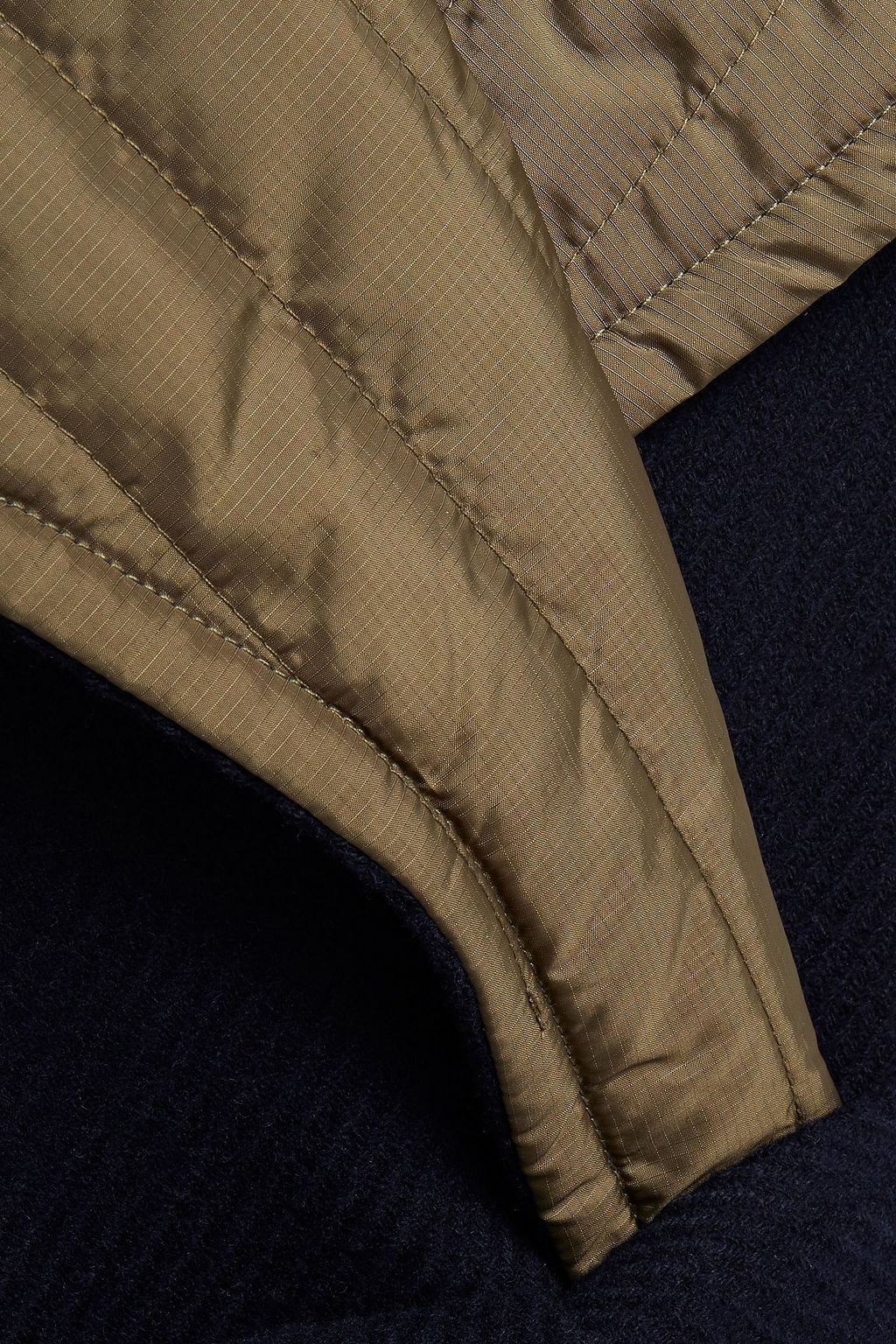 GANNI Shell-paneled belted wool-blend twill coat