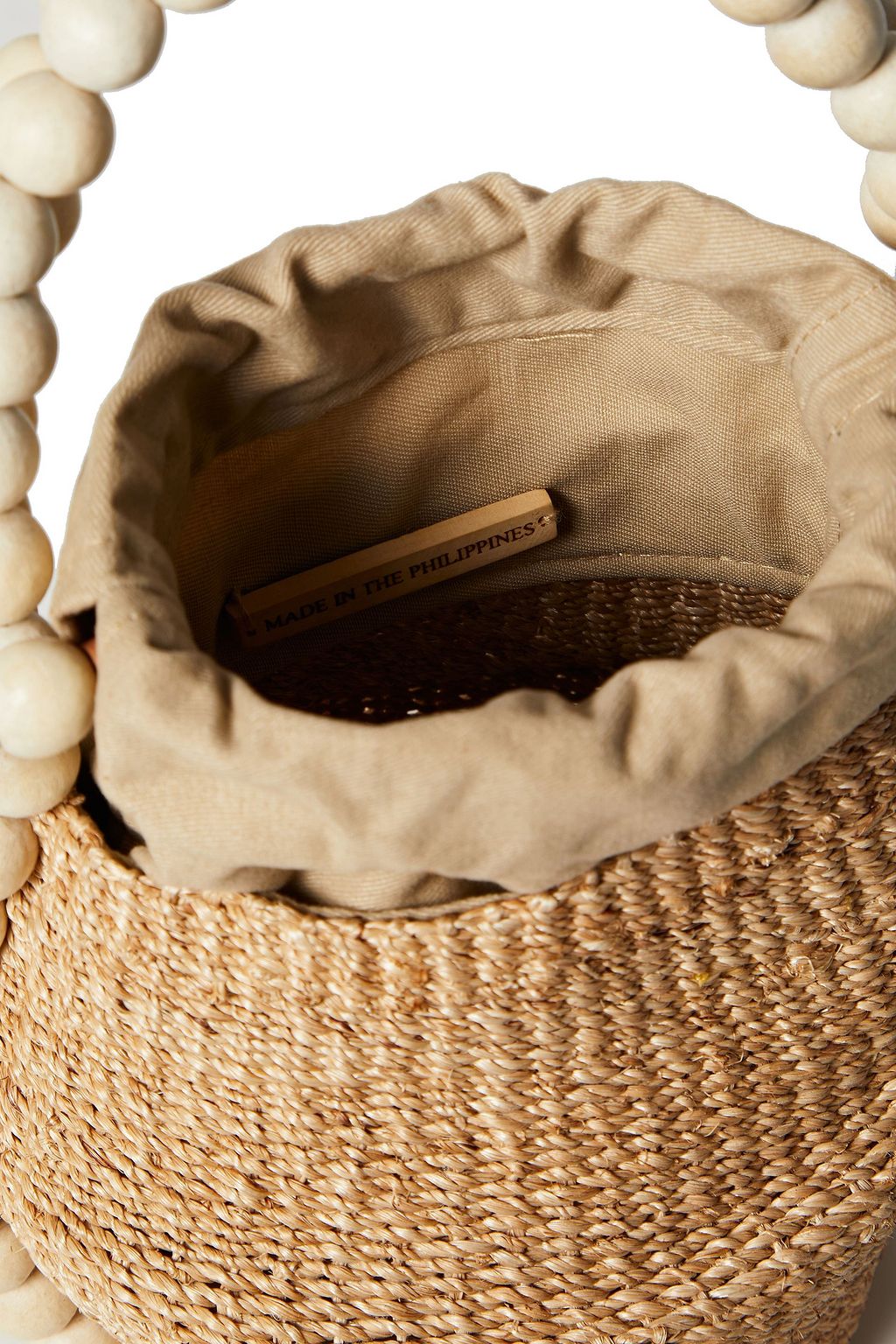 ARANÁZ Nahla leather-trimmed embellished abaca-blend bucket bag