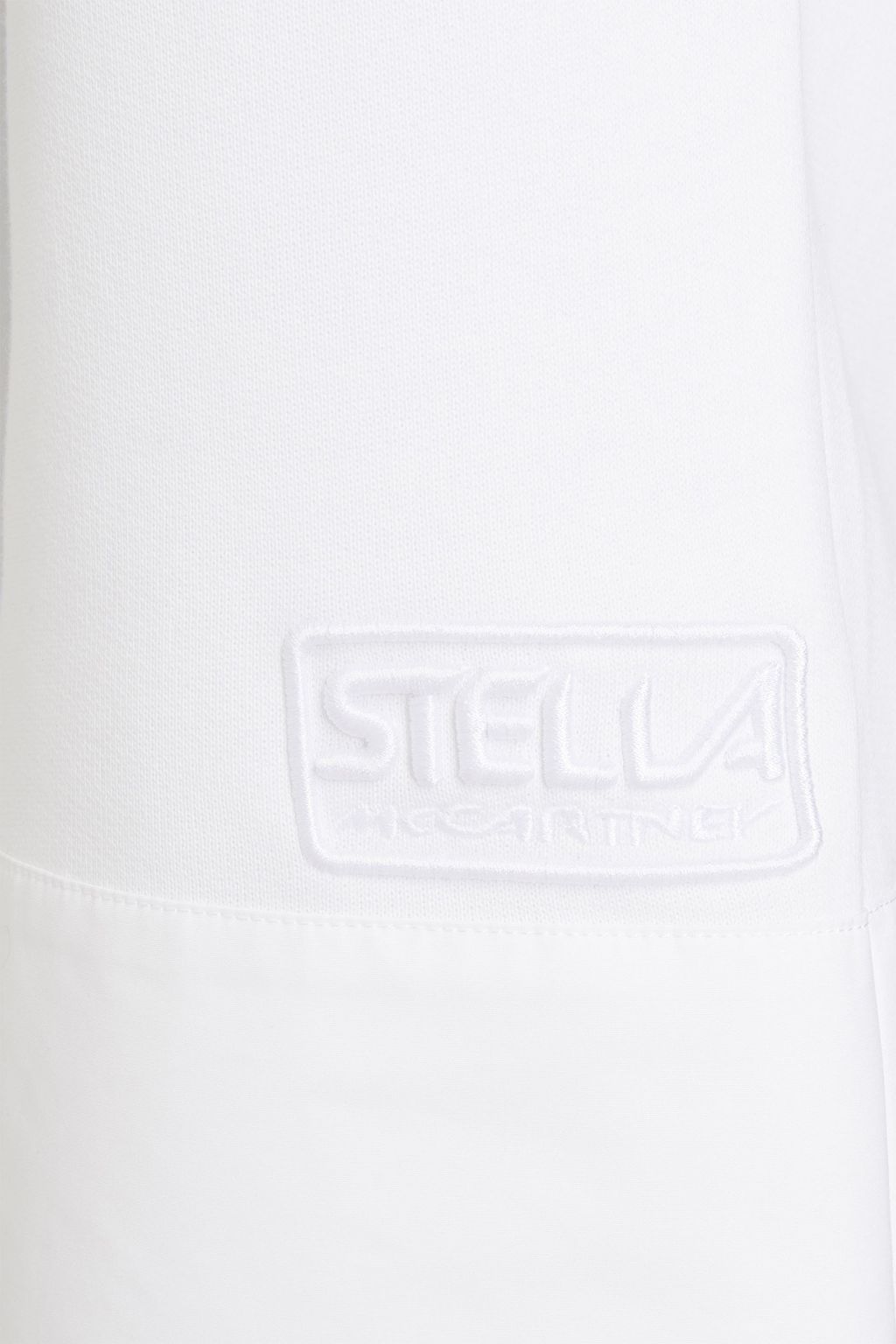 STELLA MCCARTNEY بنطلون رياضي قصير من الفليس القطني