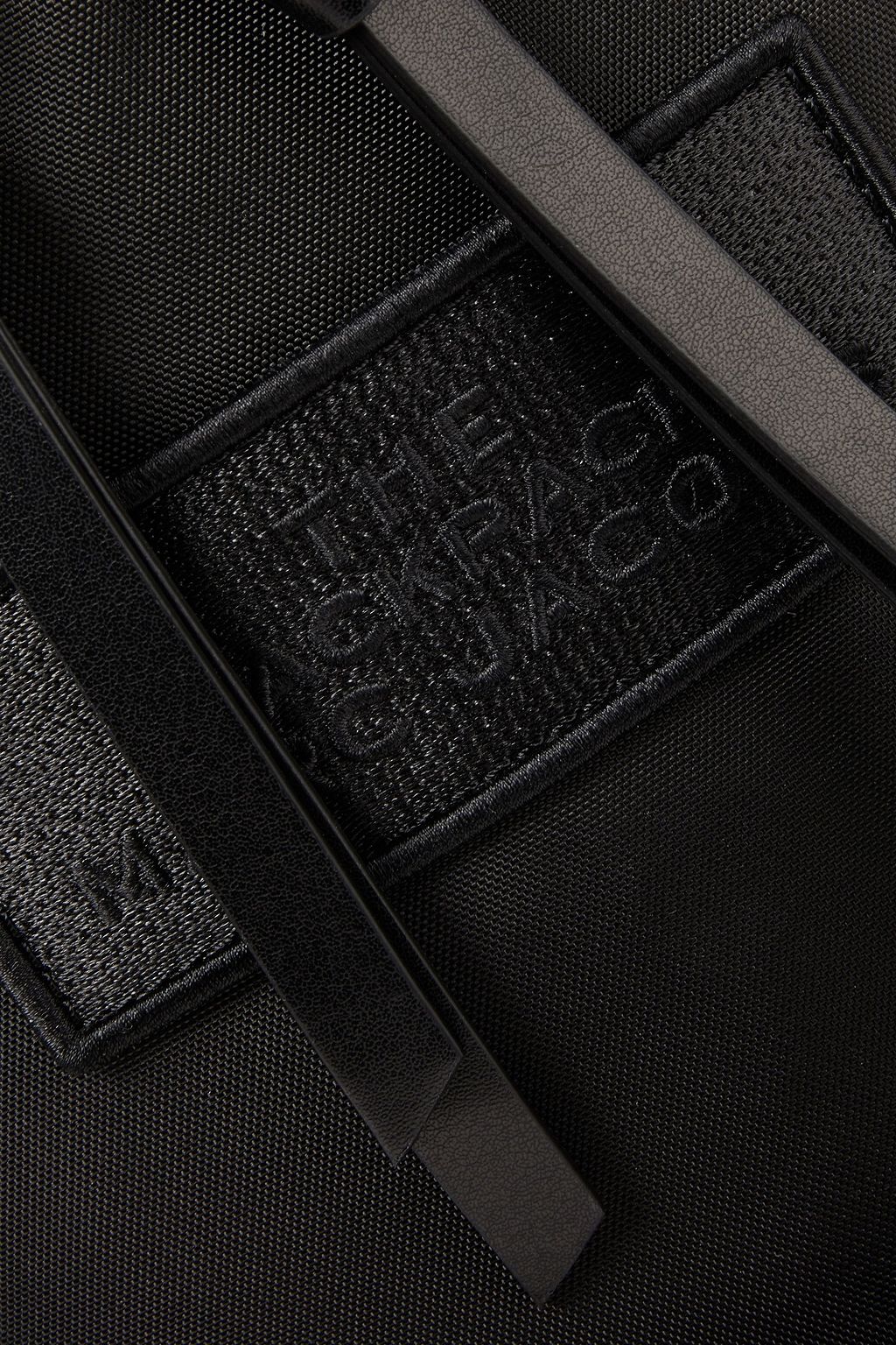MARC JACOBS Logo-appliquéd shell backpack