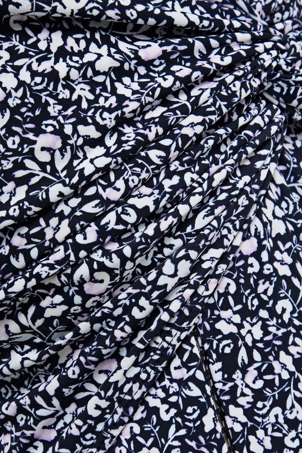 SIMKHAI Ellie twisted floral-print swimsuit