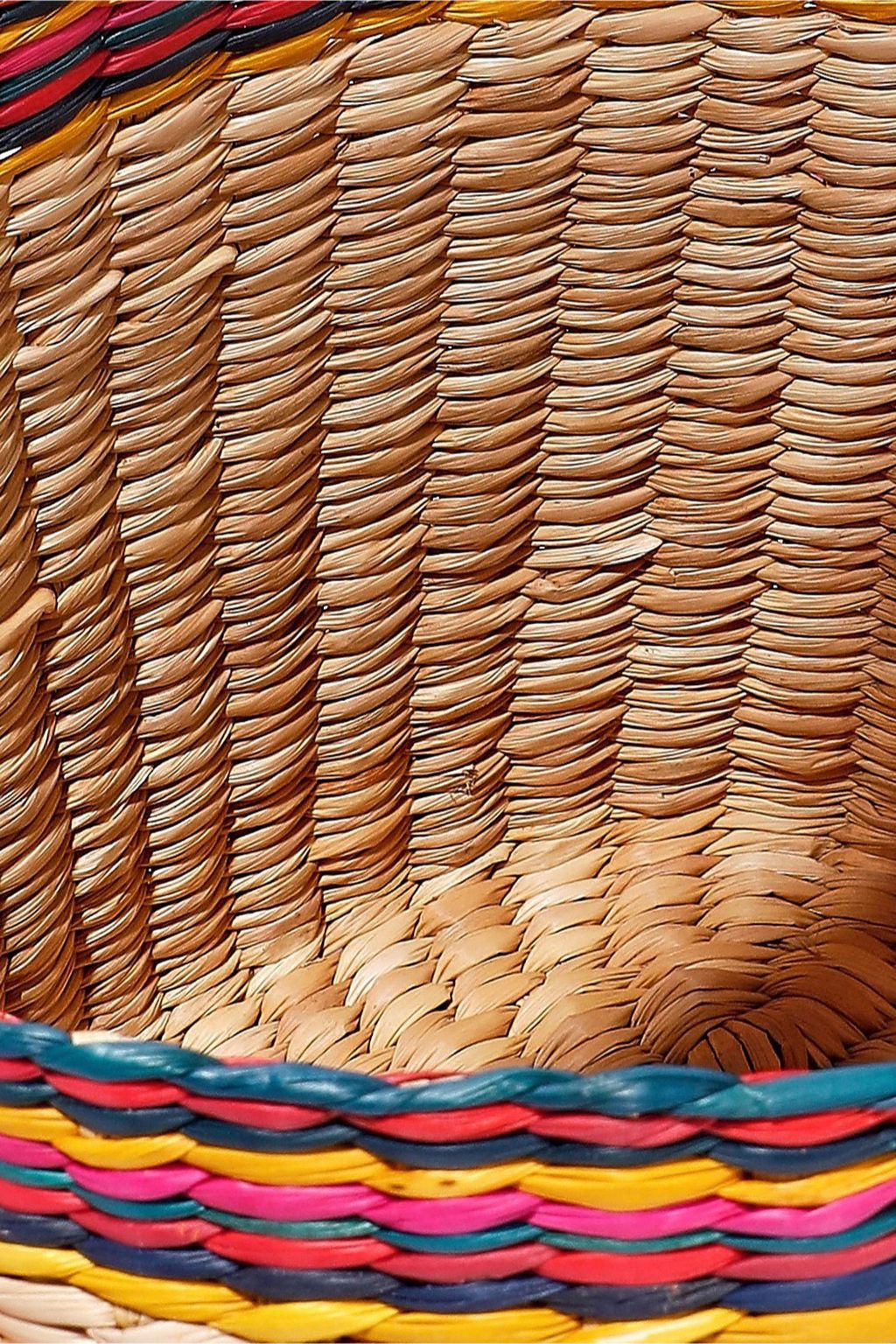 NANNACAY Nica tasseled woven straw bucket bag