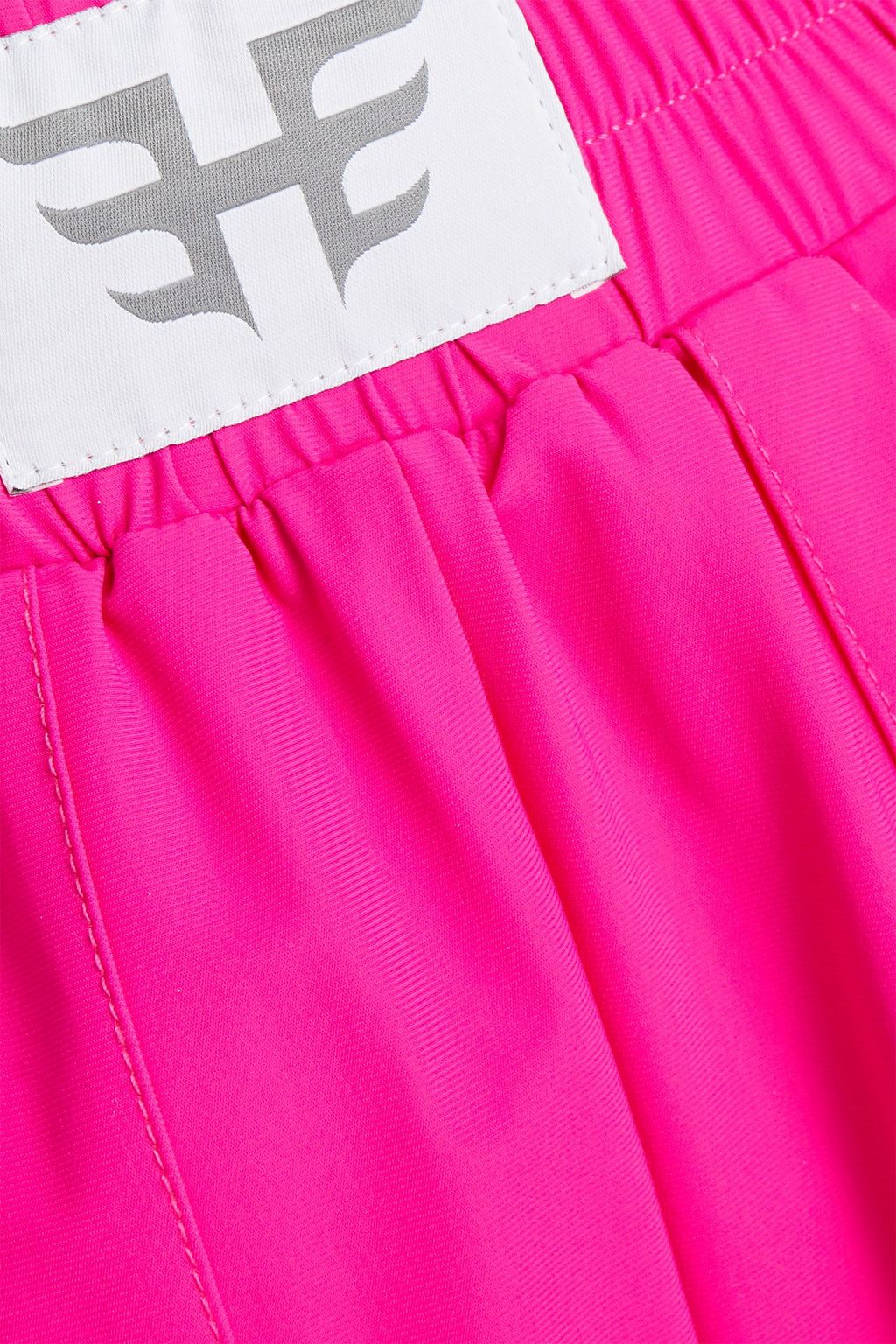 HEROINE SPORT Logo-appliquéd neon stretch shorts