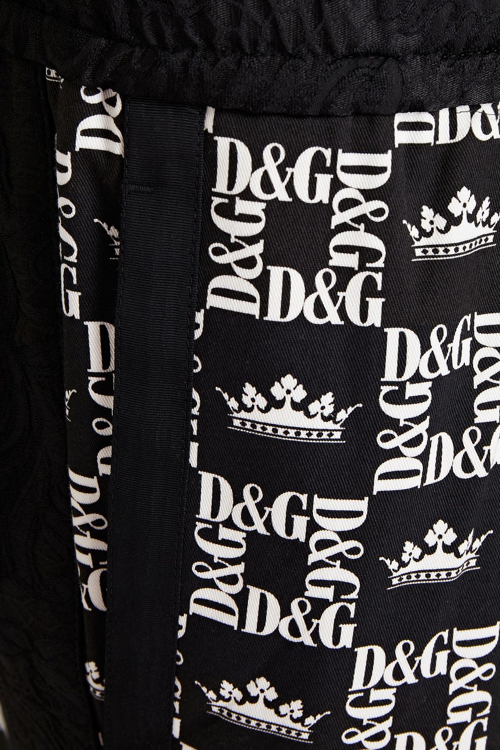 DOLCE & GABBANA Tapered monogram-print cotton-twill pants