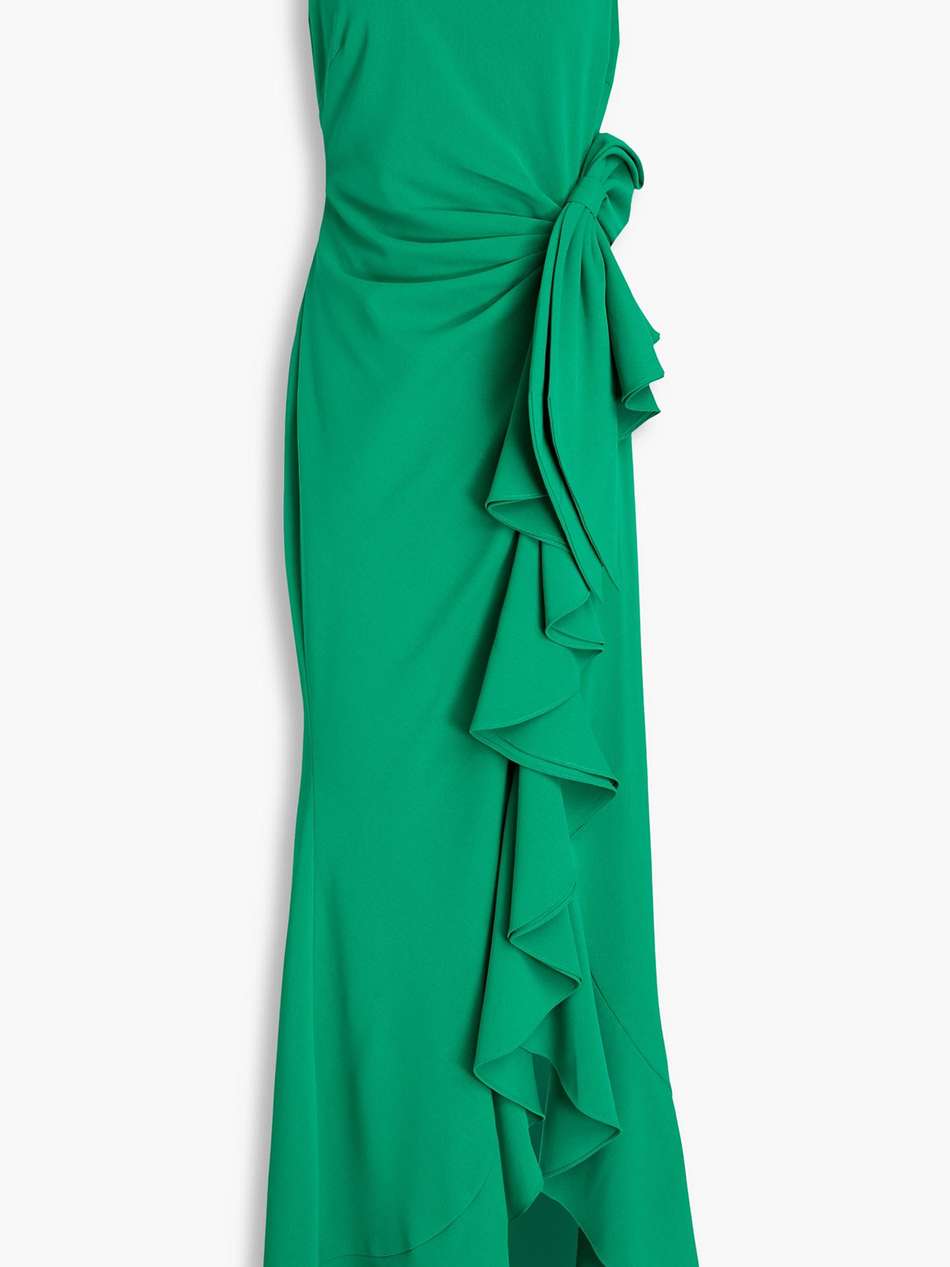 bow-embellished ruffled crepe gown