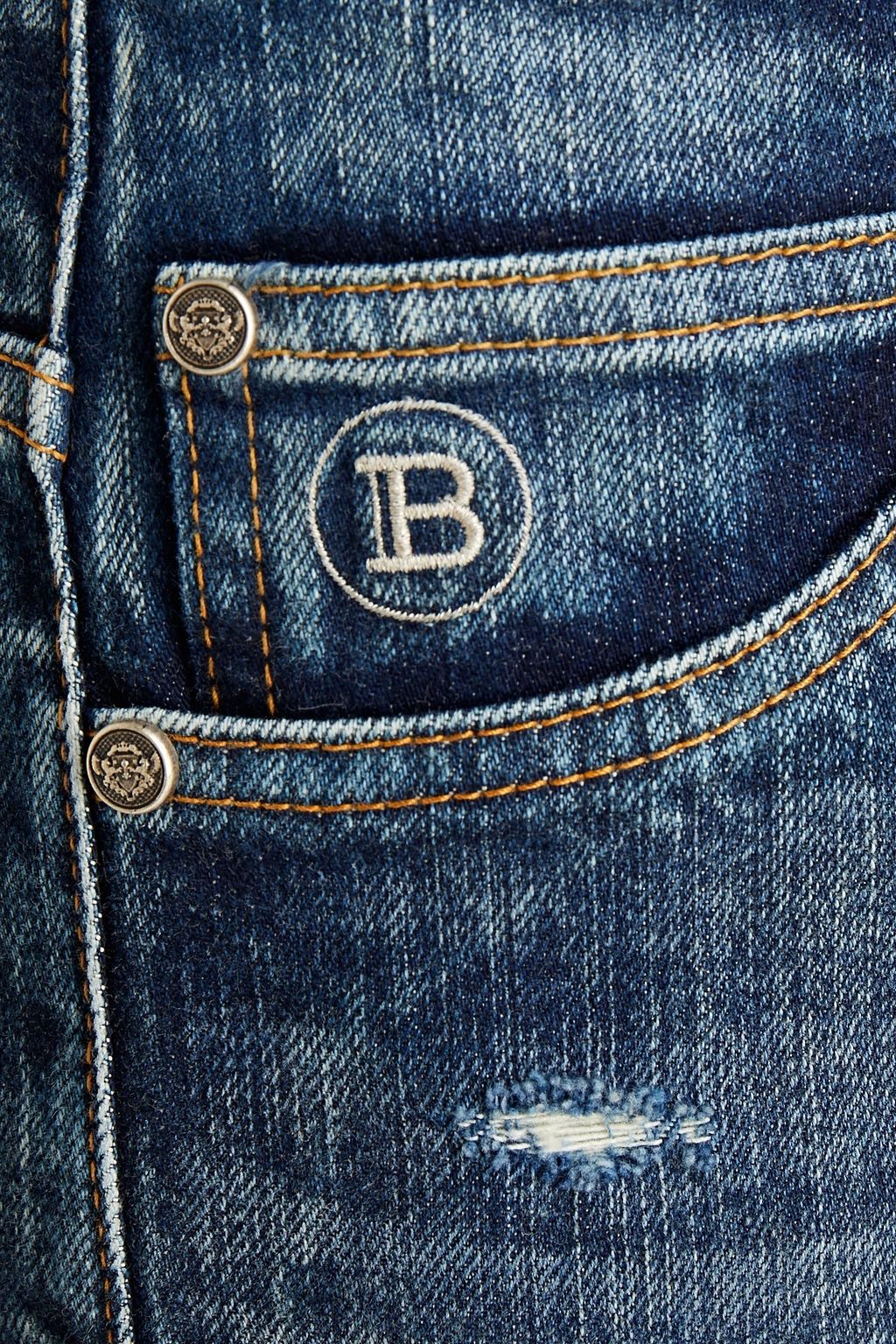 BALMAIN Slim-fit distressed faded denim jeans