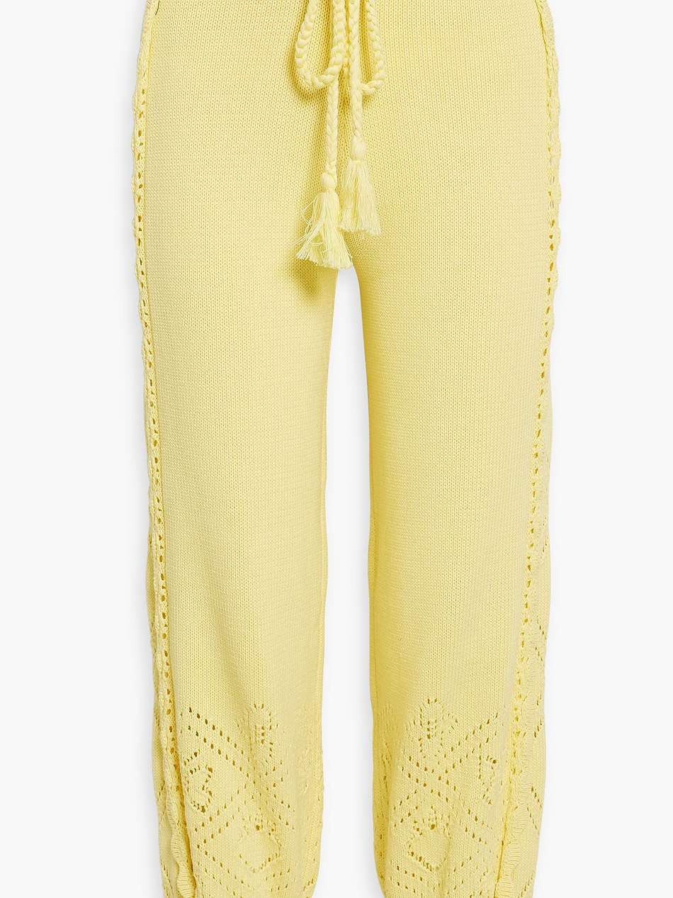 nyla tasseled crochet-knit cotton track pants