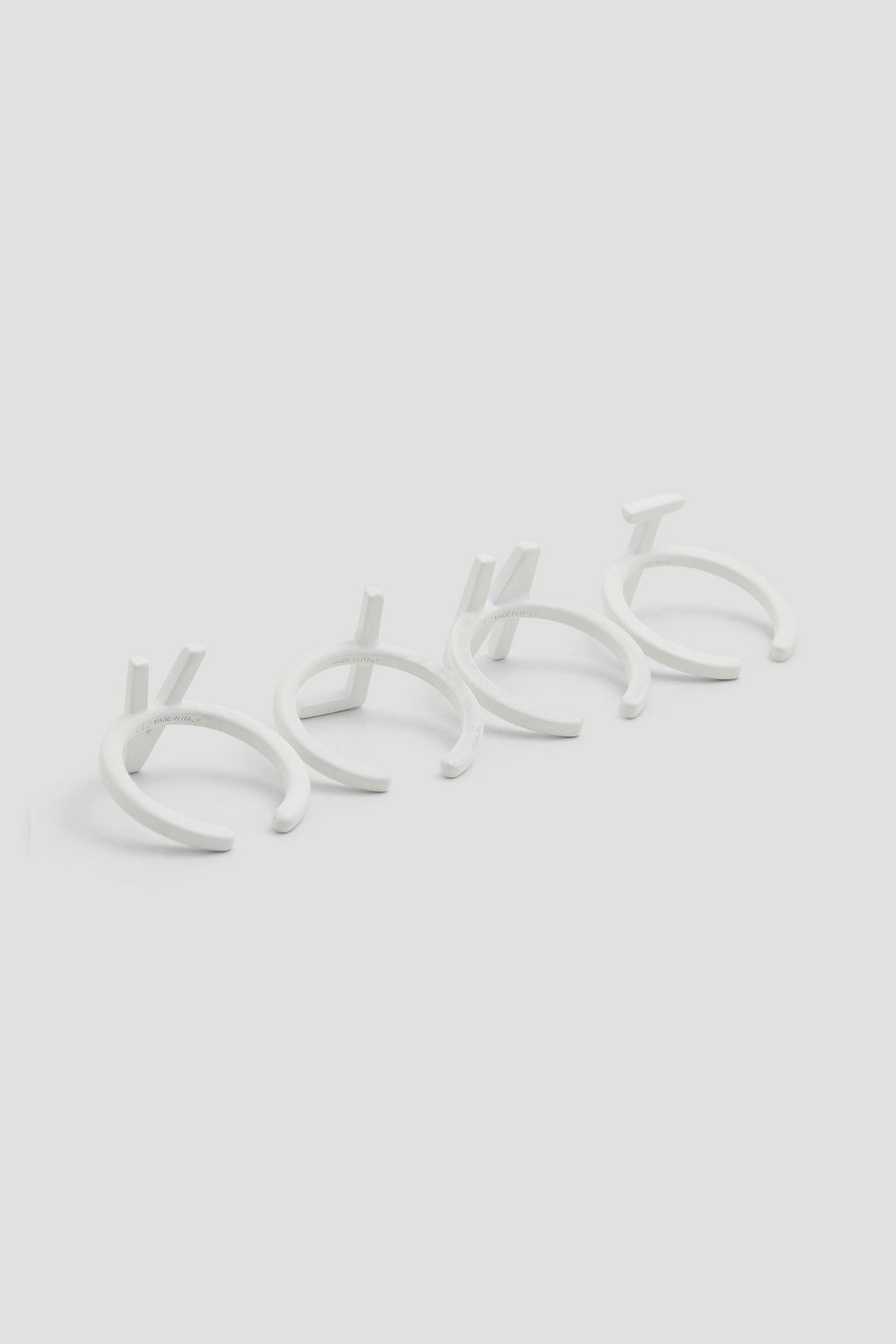 VALENTINO GARAVANI Set of four silver-tone rings