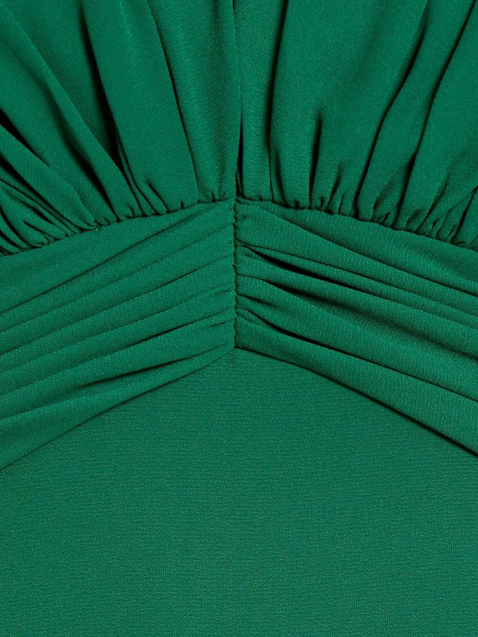 ruffle-trimmed gathered crepe gown