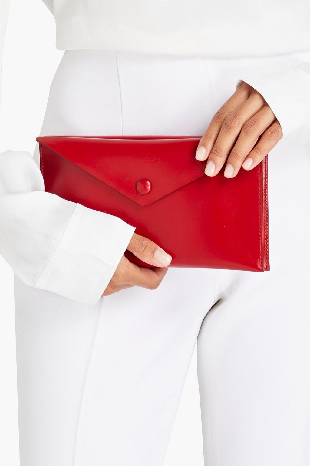 ALAÏA Leather envelope clutch THE