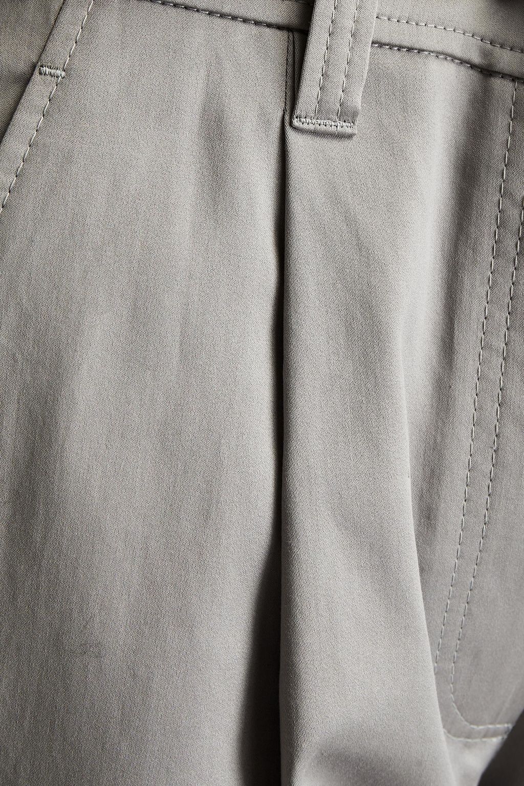 BRUNELLO CUCINELLI Karottenhose aus Baumwolle mit Zierperlen und Falten