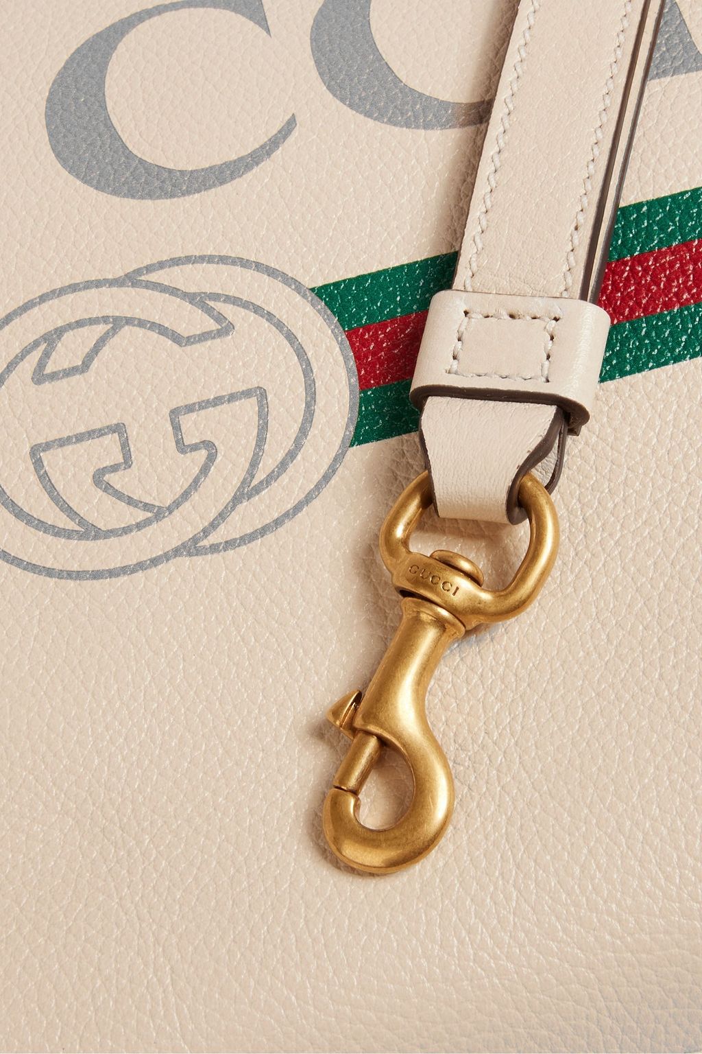 GUCCI Printed pebbled-leather pouch