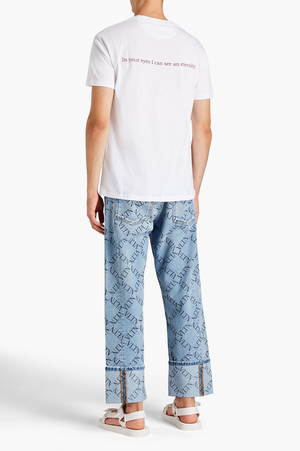 VALENTINO Logo-print distressed denim jeans