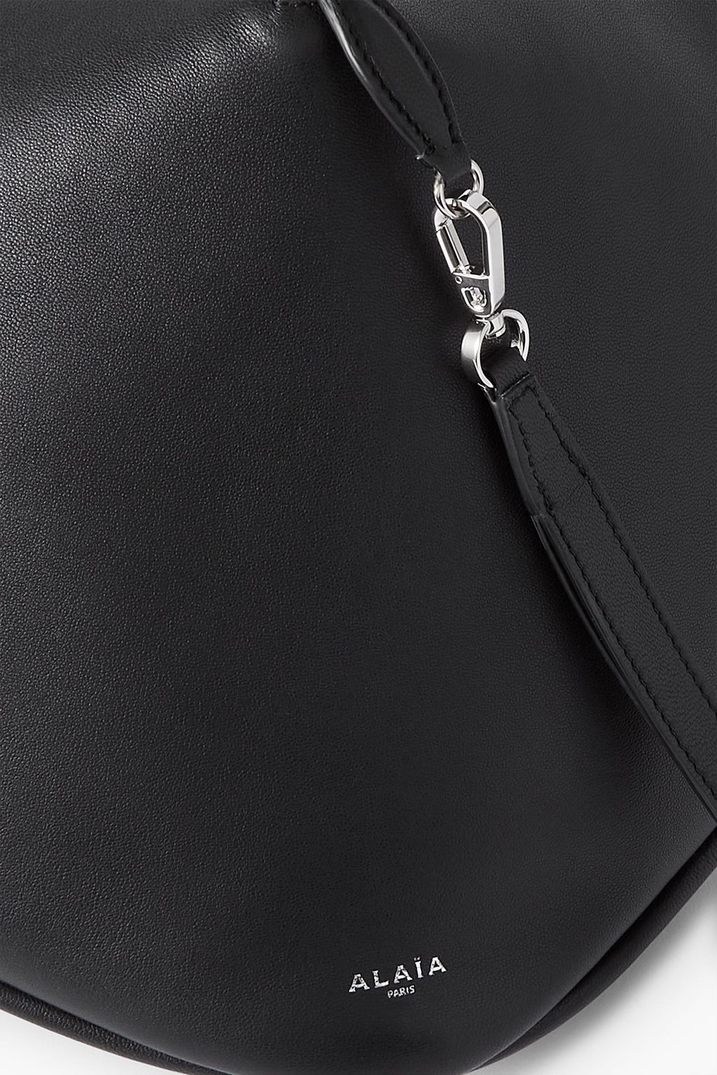 ALAÏA Le Coeur oversized leather clutch