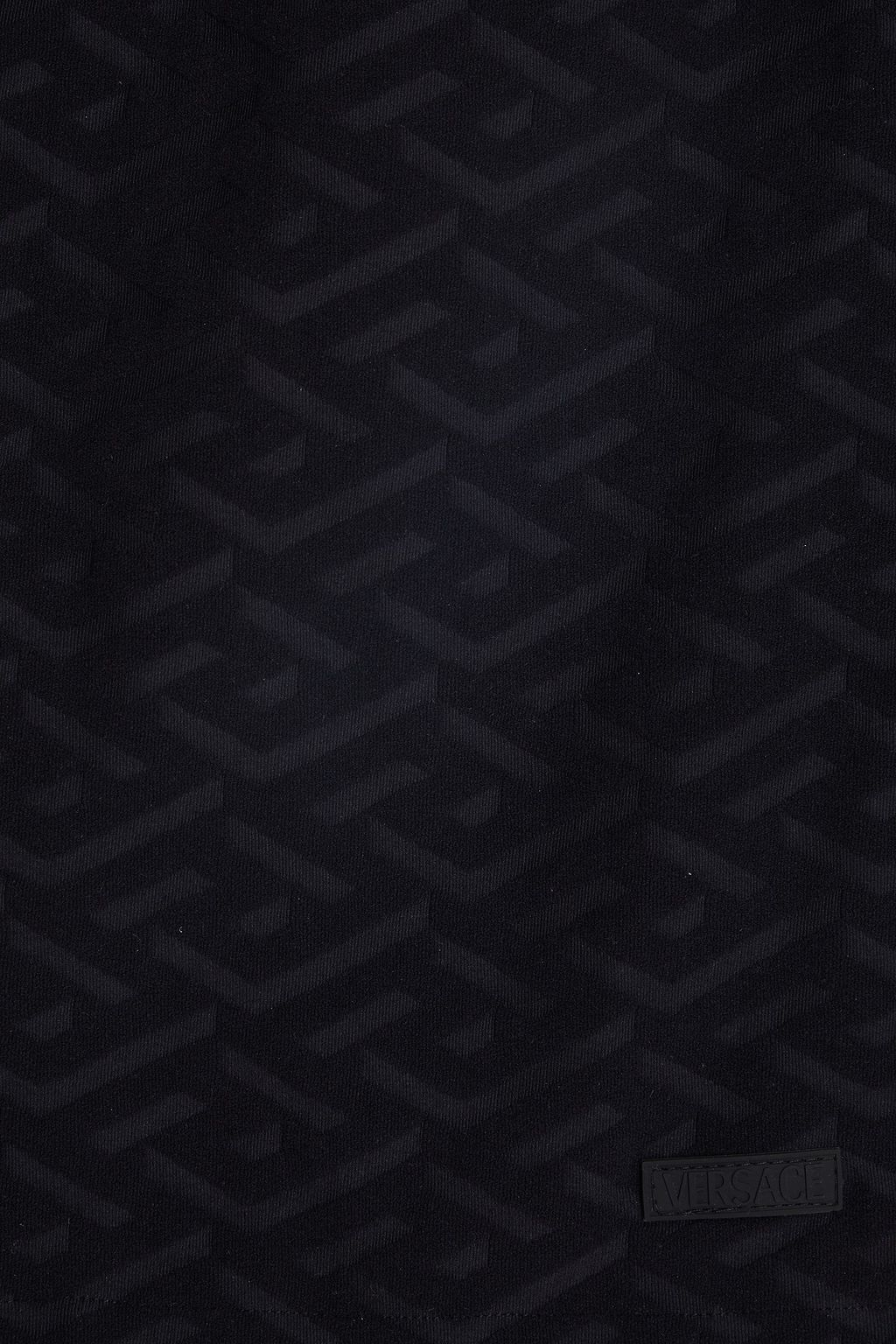 VERSACE تنورة La Greca قصيرة منقوشة من قماش تيري المطّاطي
