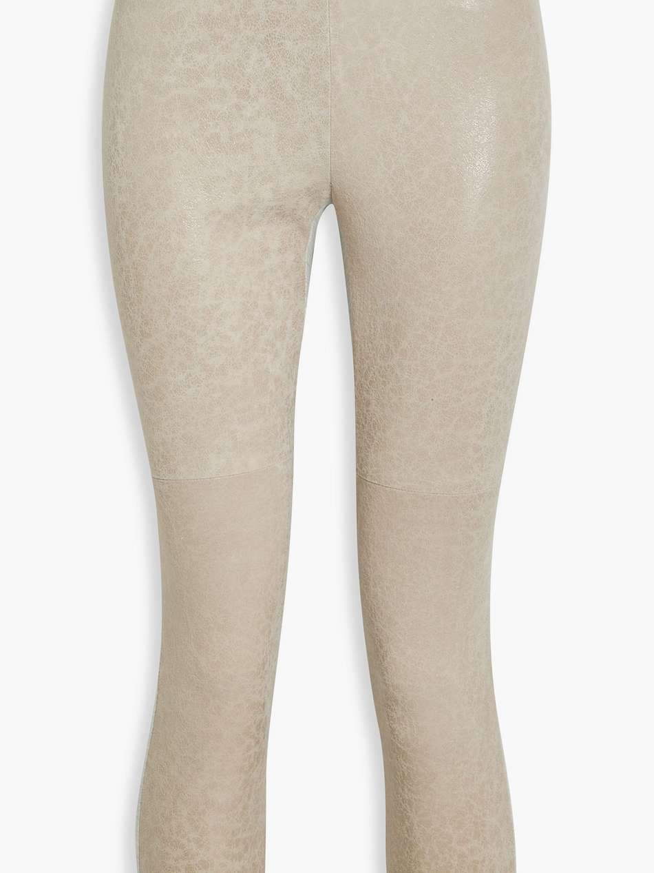 cropped jersey-paneled cracked suede leggings