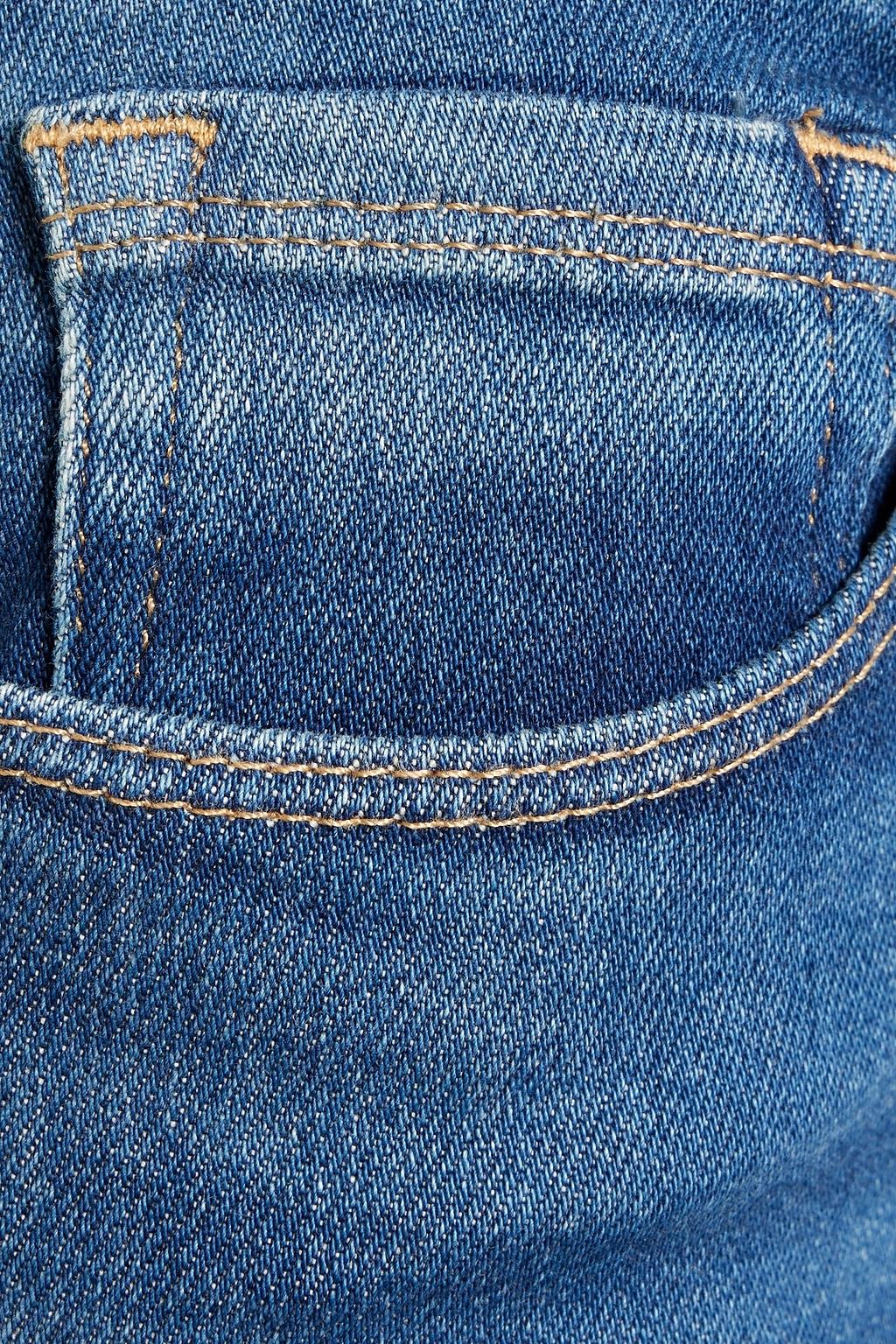 GOOD AMERICAN بنطلون جينز سكيني ’جود ليجز’ بخصر متوسط الارتفاع بلون باهت
