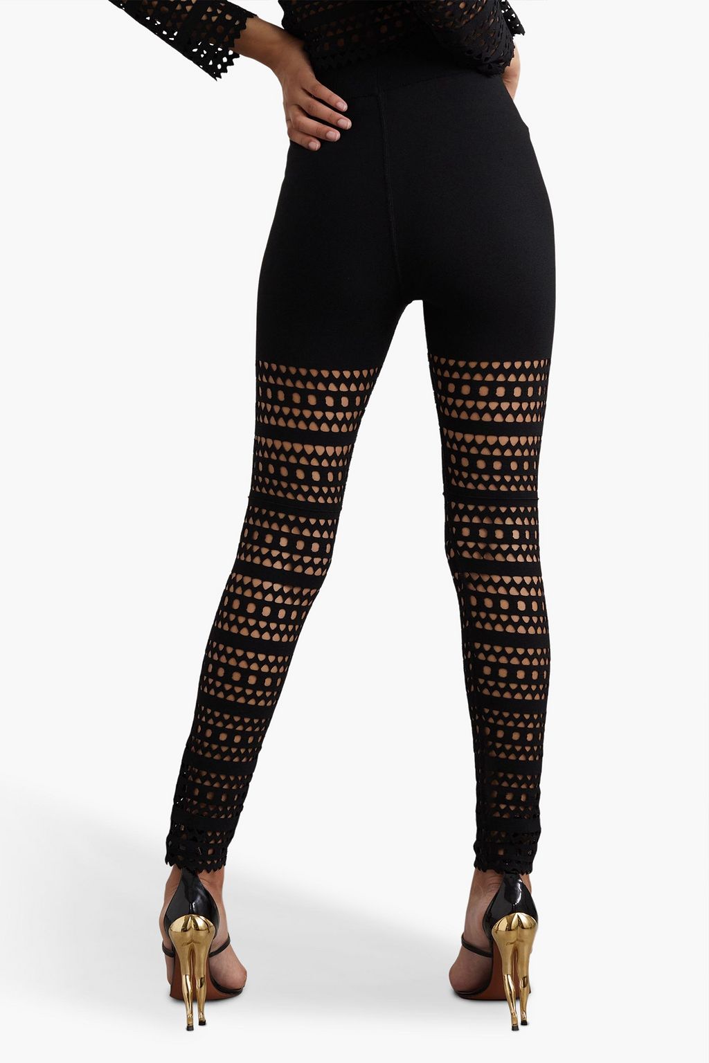 ALAÏA ليغينغز من نسيج محبوك مقصوص بالليزر