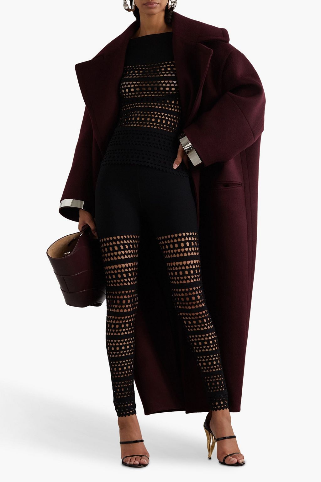 ALAÏA ليغينغز من نسيج محبوك مقصوص بالليزر
