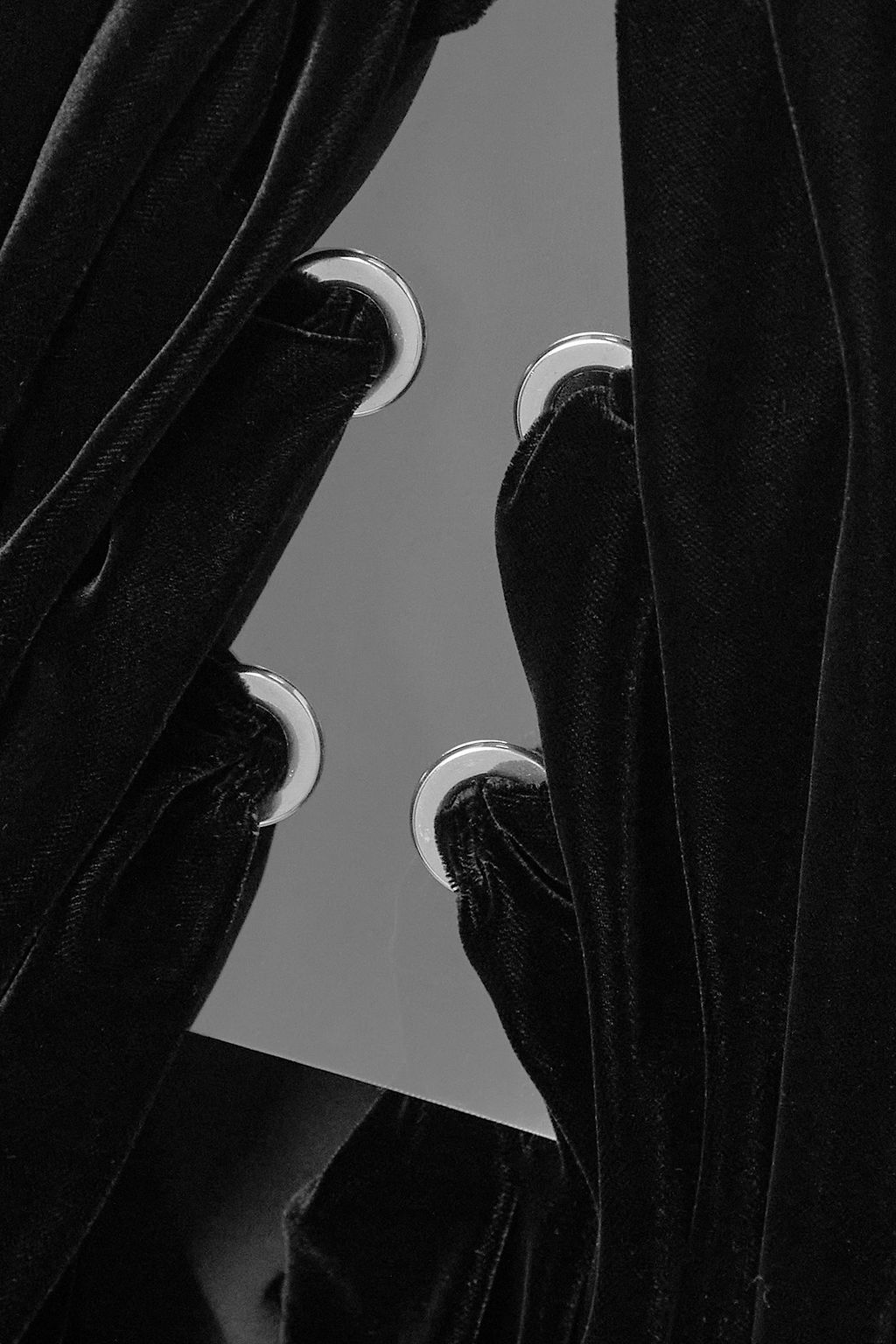 ALAÏA Lace-up PVC-paneled draped velvet maxi skirt