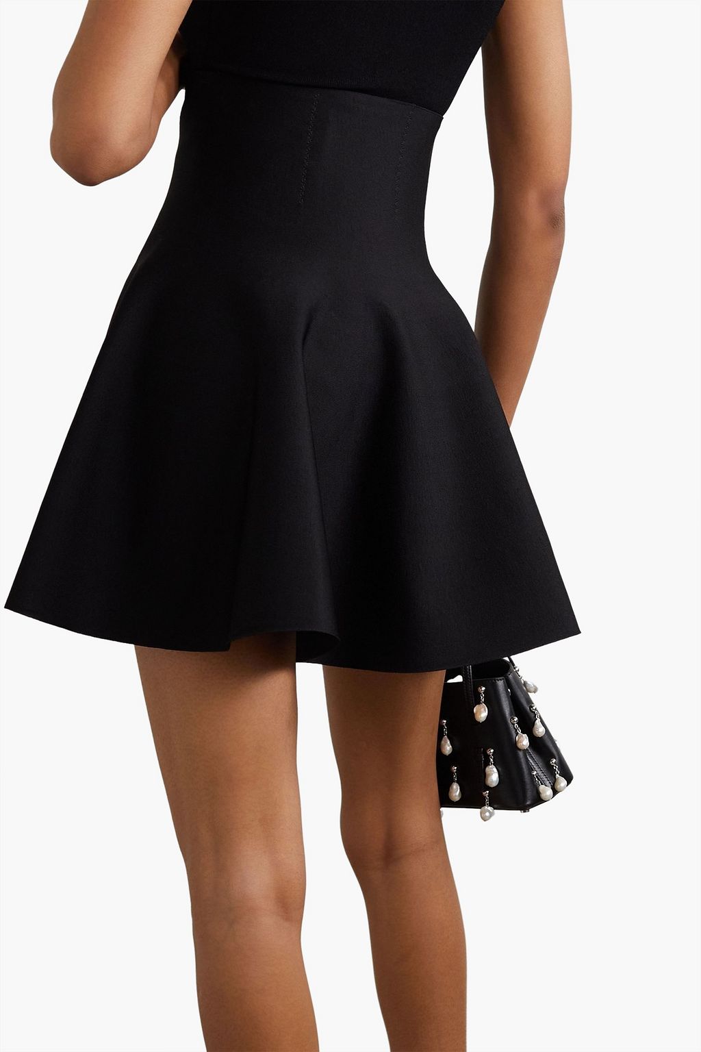 ALAÏA Lace-up knitted mini skirt