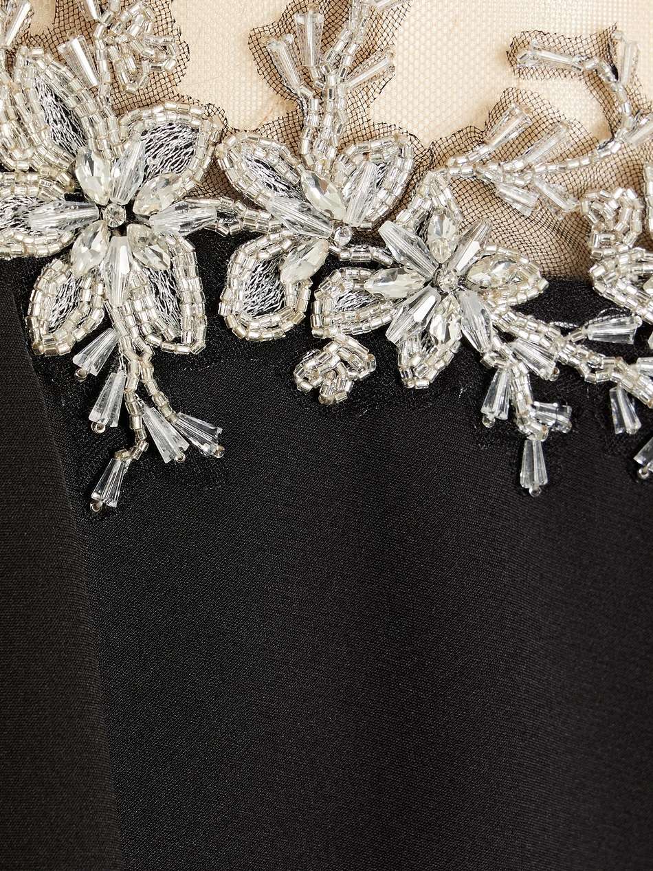 embellished tulle-paneled draped crepe gown