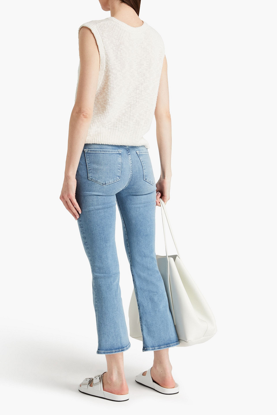 Shop Frame Le One Crop Mini Boot Faded High-rise Bootcut Jeans In Light Blue