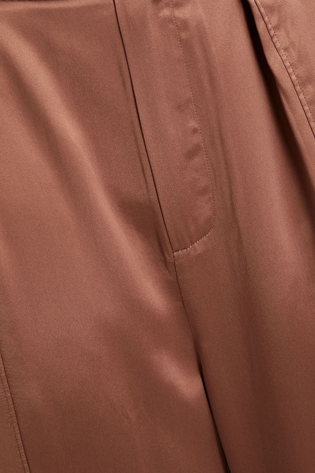 NICHOLAS Pleated silk-satin tapered pants