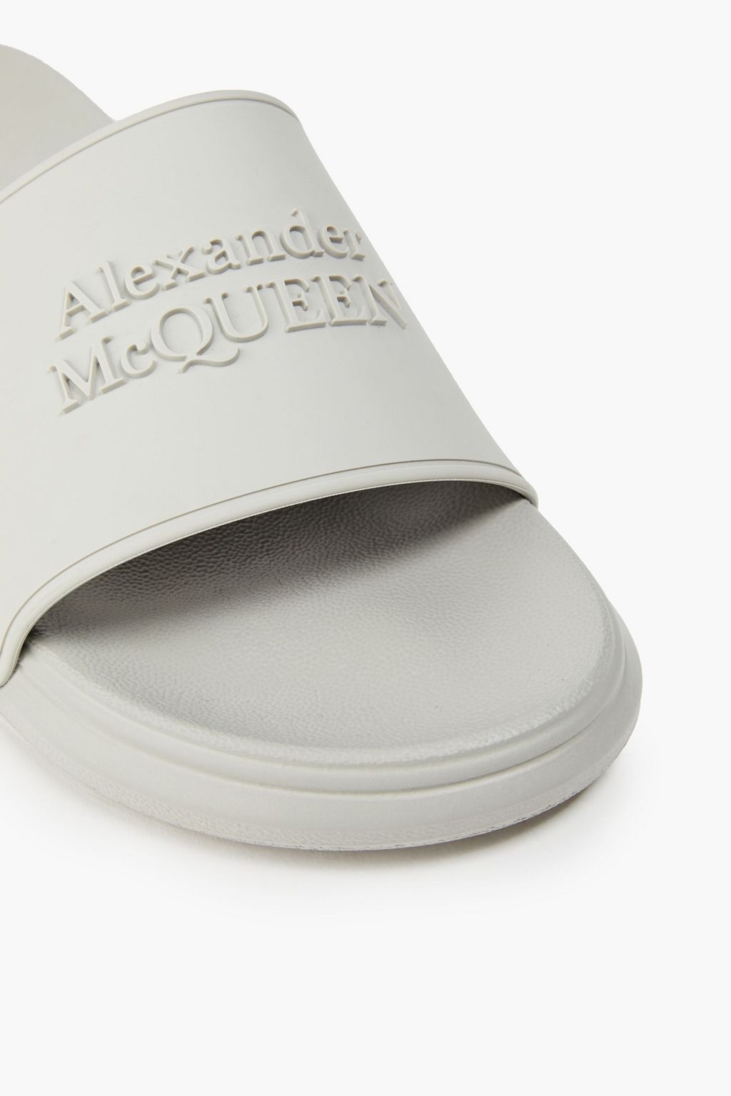 ALEXANDER MCQUEEN Embossed rubber slides