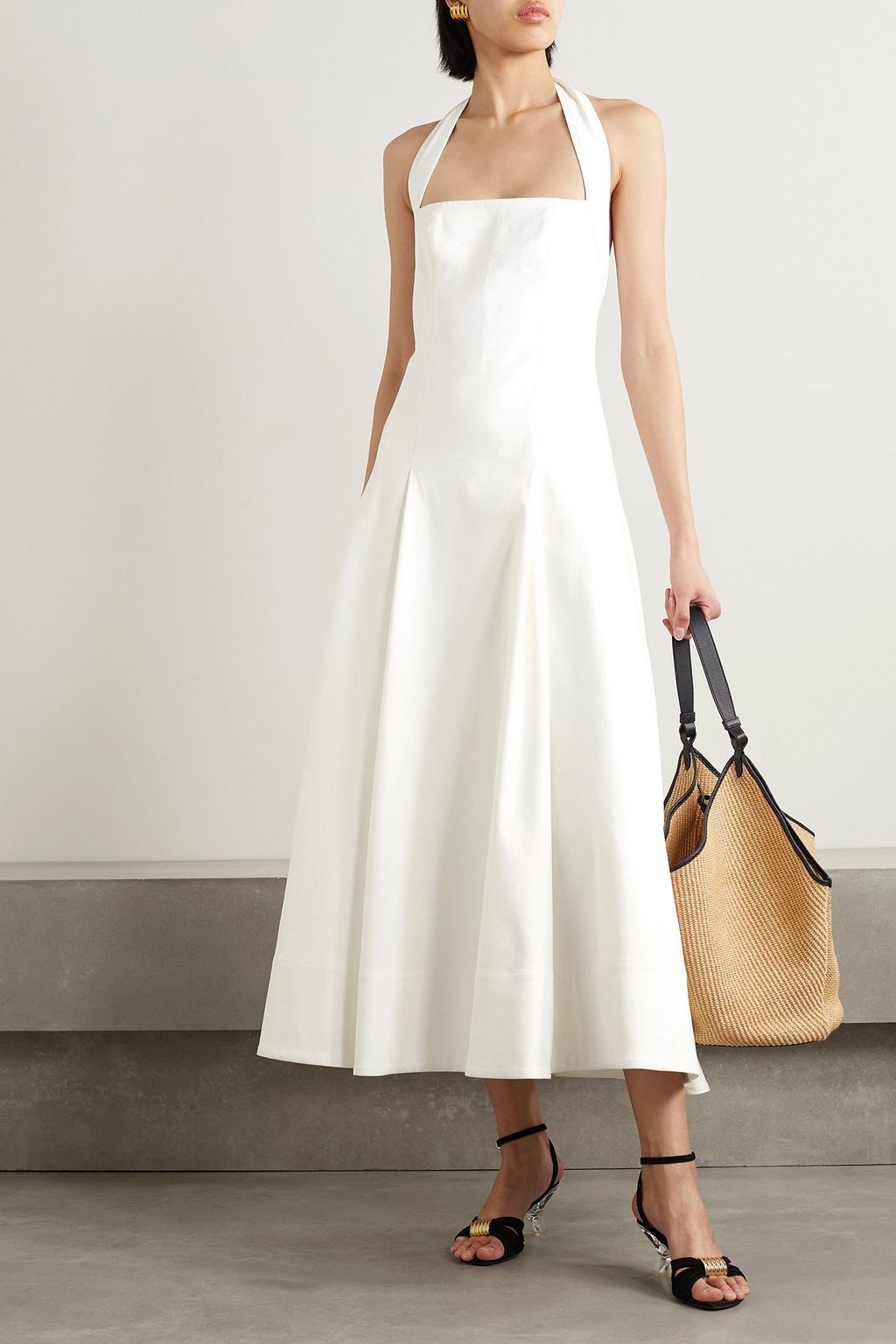 KHAITE Lalita pleated cotton-blend twill halterneck midi dress