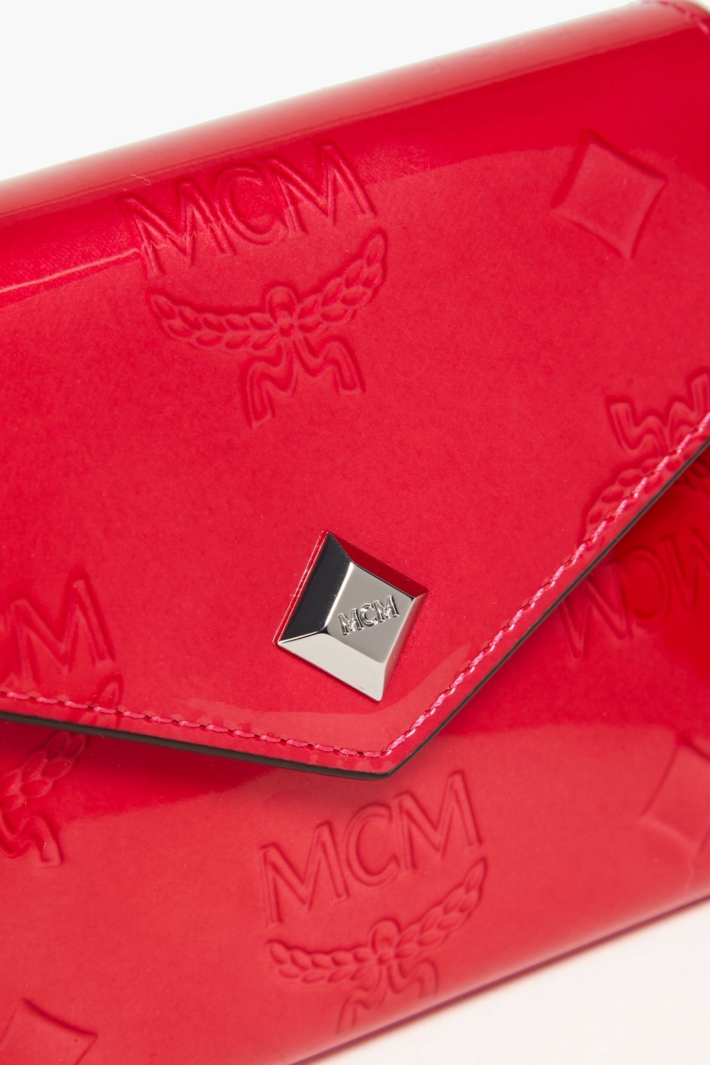 MCM Embossed glossed-leather wallet