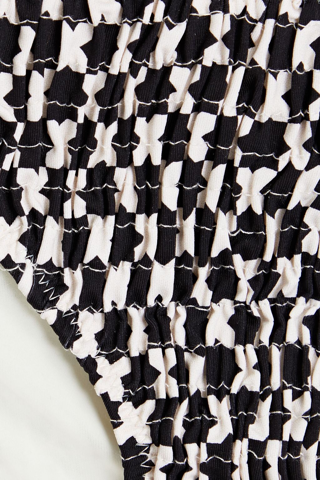 SOLID & STRIPED سروال بكيني منخفض الخصر ’رايتشل’ مزين بطبعات