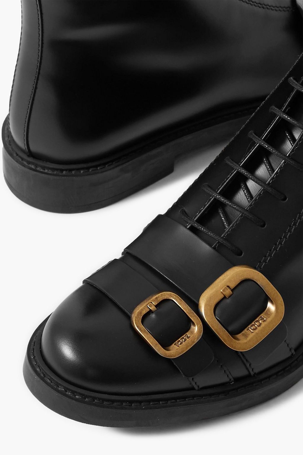 TOD'S حذاء بوت بطول الكاحل من الجلد مزود بإبزيم