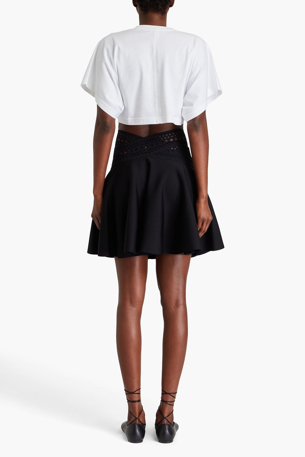 ALAÏA Vienne laser-cut knitted mini skirt