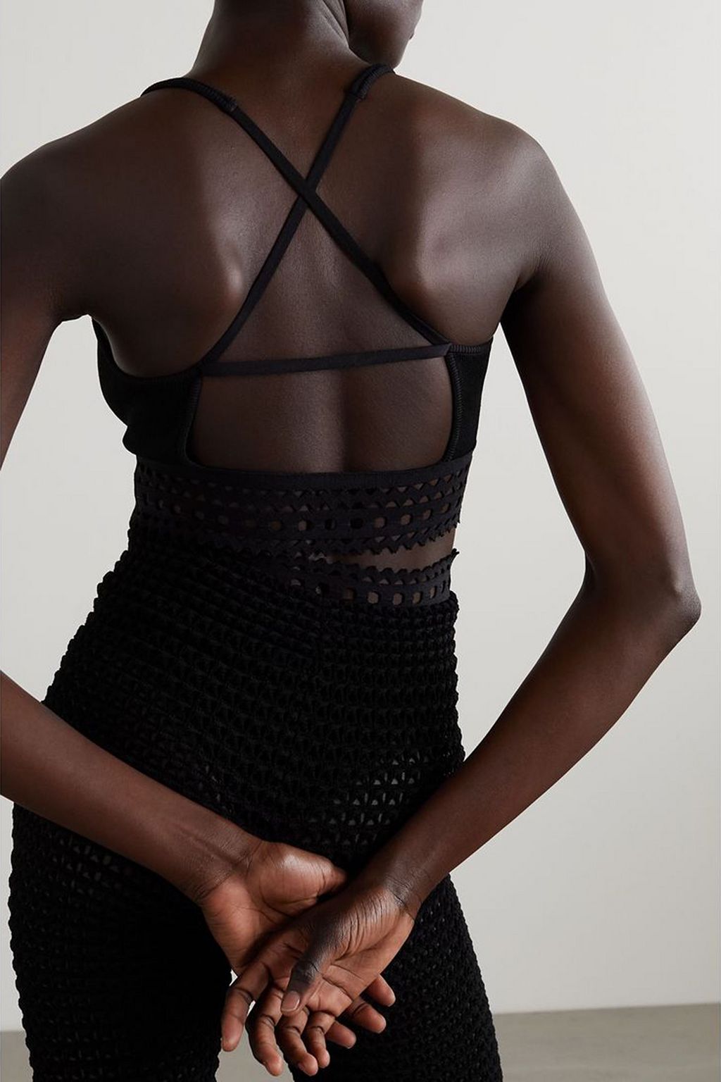 ALAÏA Archetypes cropped laser-cut stretch-knit top