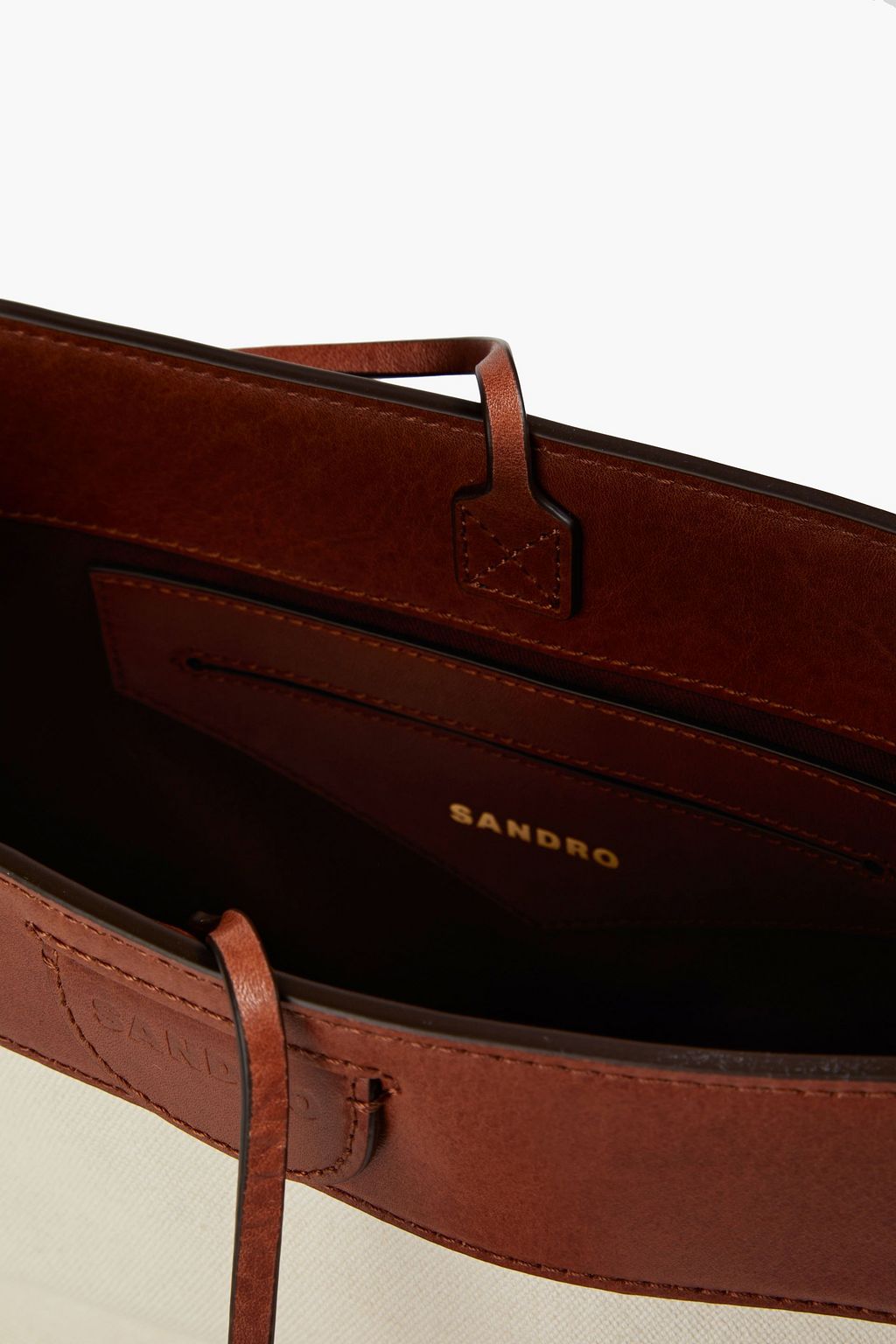 SANDRO Leather and canvas bucket bag