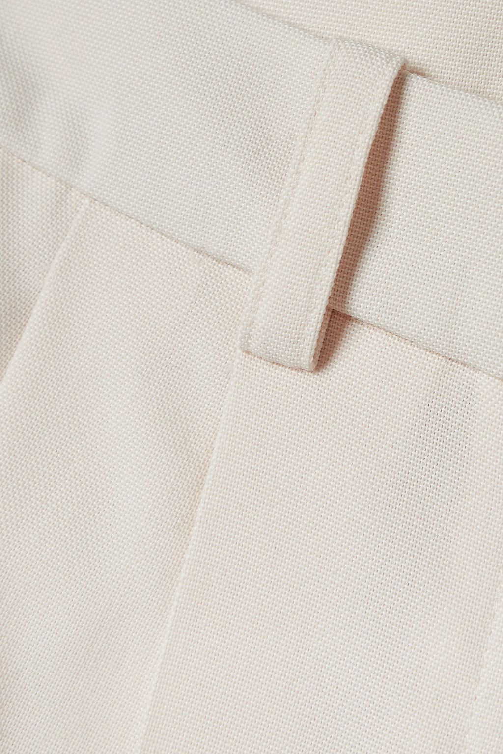 KHAITE Plissierte Hose mit weitem Bein aus Grain de Poudre aus einer Wollmischung