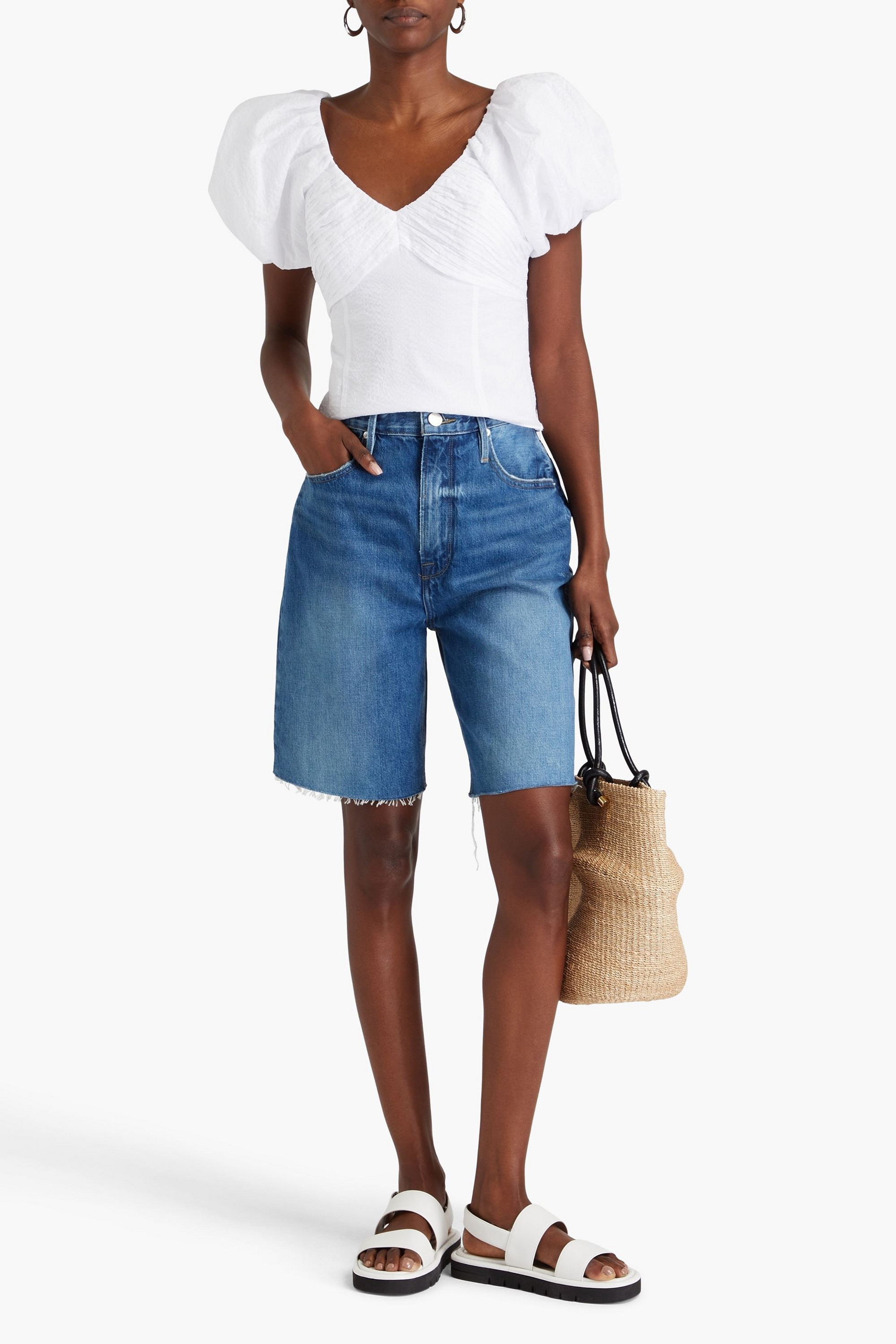 FRAME Faded denim shorts
