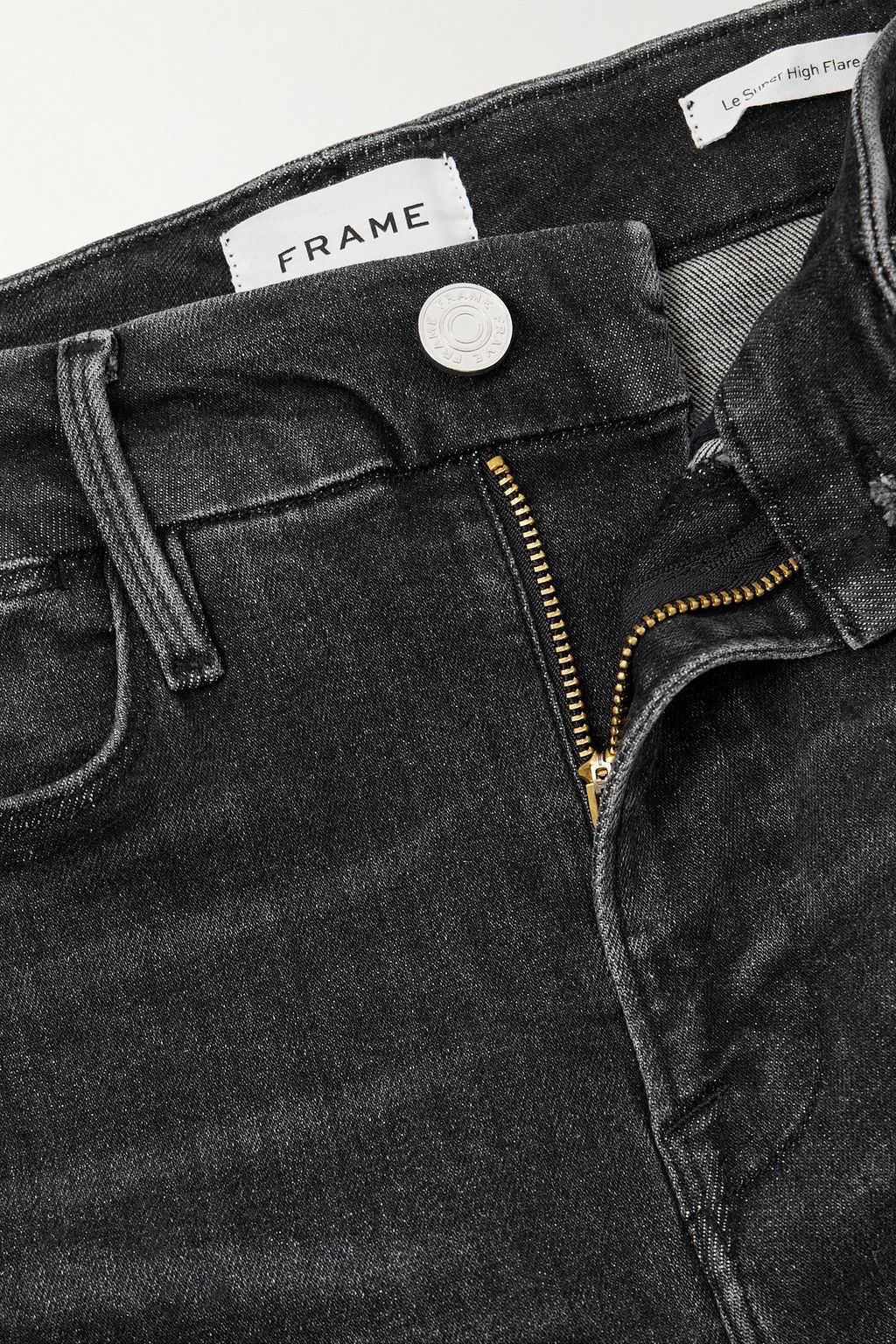 FRAME جينز 'لو سوبر' بحواف واسعة وخصر عالٍ