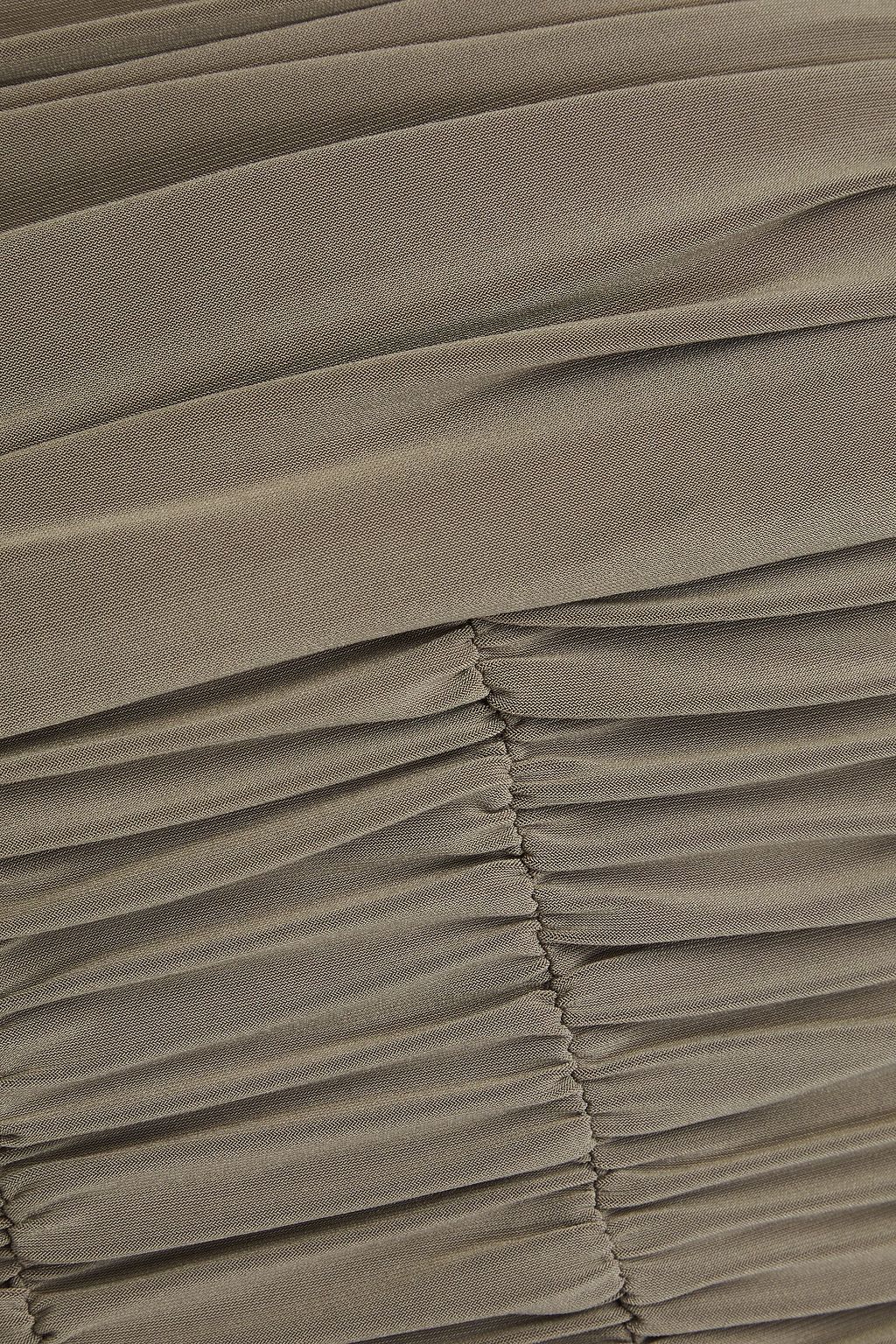 TIBI بلوزة من الجيرسي بتصميم مكشوف الكتفين يمكن ارتداؤها بعدة طرق بتأثير مزموم